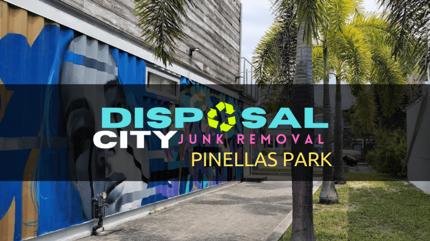 Junk removal A commercial mural advertisement for a junk removal service called "Disposal City" located in Pinellas Park, featuring bold lettering on an abstract blue background along the exterior wall of a building, with tropical